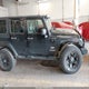 1J4HA5H15AL140291 2010 Jeep Wrangler Unlimited Sahara auction photo thumbnail 14