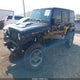 1C4BJWEG6FL728329 2015 Jeep Wrangler Unlimited Altitude auction photo thumbnail 2