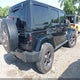 1C4BJWEG6FL728329 2015 Jeep Wrangler Unlimited Altitude auction photo thumbnail 4