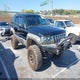 1J4GW48N0YC204645 2000 Jeep Grand Cherokee Laredo auction photo thumbnail 1