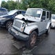 1J4BA5H16AL167487 2010 Jeep Wrangler Unlimited Sahara auction photo thumbnail 2