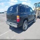 1GNEK13T61R205810 2001 Chevrolet Tahoe Lt auction photo thumbnail 4