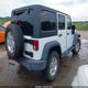 1C4BJWDG1FL759165 2015 Jeep Wrangler Unlimited Sport auction photo thumbnail 4