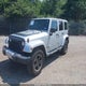 1C4BJWEGXCL263808 2012 Jeep Wrangler Unlimited Sahara auction photo thumbnail 2