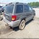 1J4GW48S7YC154493 2000 Jeep Grand Cherokee Laredo auction photo thumbnail 4