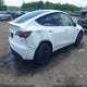 7SAYGDEE8PA059111 2023 Tesla Model Y Awd/Long Range Dual Motor All-Wheel Drive auction photo thumbnail 4