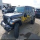 1C4HJXEG0MW855119 2021 Jeep Wrangler Unlimited Sahara 4X4 auction photo thumbnail 2