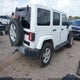 1C4HJWEG3EL240285 2014 Jeep Wrangler Unlimited Sahara auction photo thumbnail 4