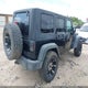 1C4BJWDG5GL141994 2016 Jeep Wrangler Unlimited Sport auction photo thumbnail 4
