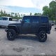1C4BJWDG5GL187390 2016 Jeep Wrangler Unlimited Black Bear auction photo thumbnail 14