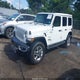 1C4HJXEG9NW252543 2022 Jeep Wrangler Unlimited Sahara 4X4 auction photo thumbnail 2