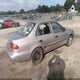 2T1BR12E1YC318448 2000 Toyota Corolla Ce auction photo thumbnail 4