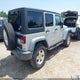 1C4BJWDG7CL214714 2012 Jeep Wrangler Unlimited Sport auction photo thumbnail 4
