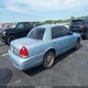 2FAFP74W1YX154250 2000 Ford Crown Victoria Lx auction photo thumbnail 4