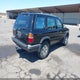 JN8AR05Y4XW321446 1999 Nissan Pathfinder Le/Se/Xe auction photo thumbnail 4