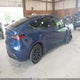 7SAYGDEE9PF889132 2023 Tesla Model Y Awd/Long Range Dual Motor All-Wheel Drive auction photo thumbnail 4