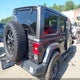 1C4HJXEG5KW637707 2019 Jeep Wrangler Unlimited Sahara 4X4 auction photo thumbnail 4