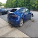 7SAYGDEE3PF685636 2023 Tesla Model Y Awd/Long Range Dual Motor All-Wheel Drive auction photo thumbnail 4