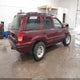 1J4GW58N6YC200105 2000 Jeep Grand Cherokee Limited auction photo thumbnail 4