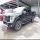 1N6AA1E53KN506422 2019 Nissan Titan Pro-4X auction photo thumbnail 2