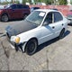 KMHCG45C42U375352 2002 Hyundai Accent Gl auction photo thumbnail 2