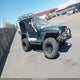 1J4FA59S0YP730853 2000 Jeep Wrangler Sahara auction photo thumbnail 1