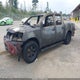 1N6AA0EC4EN517569 2014 Nissan Titan Pro-4X auction photo thumbnail 2