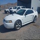 1FAFP4049YF308623 2000 Ford Mustang auction photo thumbnail 2