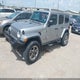 1C4HJXEG9JW111272 2018 Jeep Wrangler Unlimited Sahara 4X4 auction photo thumbnail 2