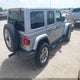 1C4HJXEG9JW111272 2018 Jeep Wrangler Unlimited Sahara 4X4 auction photo thumbnail 4