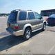 JNRAR07Y4XW063857 1999 Infiniti Qx4 Luxury auction photo thumbnail 4