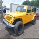 1C4HJWEG5DL560447 2013 Jeep Wrangler Unlimited Sahara auction photo thumbnail 2