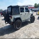1C4BJWDG1FL666131 2015 Jeep Wrangler Unlimited Willys Wheeler auction photo thumbnail 4