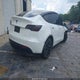7SAYGDEE6NF364669 2022 Tesla Model Y Long Range Dual Motor All-Wheel Drive auction photo thumbnail 4