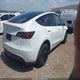 7SAYGDEE8PA044303 2023 Tesla Model Y Awd/Long Range Dual Motor All-Wheel Drive auction photo thumbnail 4