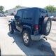 1J4FA541X9L763737 2009 Jeep Wrangler Sahara auction photo thumbnail 3