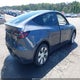 7SAYGDEEXPF869763 2023 Tesla Model Y Awd/Long Range Dual Motor All-Wheel Drive auction photo thumbnail 4