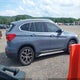 WBXJG9C01M5T18141 2021 BMW X1 xDrive28I auction photo thumbnail 13