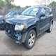 1J4RR4GG9BC597880 2011 Jeep Grand Cherokee Laredo auction photo thumbnail 2