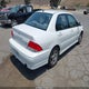 JA3AJ86E23U037033 2003 Mitsubishi Lancer Oz Rally auction photo thumbnail 4