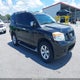 5N1BA0ND6BN614893 2011 Nissan Armada Sv auction photo thumbnail 1