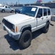 1J4FF48S61L597719 2001 Jeep Cherokee Sport auction photo thumbnail 2
