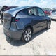 7SAYGDEEXPF619228 2023 Tesla Model Y Awd/Long Range Dual Motor All-Wheel Drive auction photo thumbnail 4