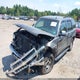 1GNEK13Z42J301178 2002 Chevrolet Tahoe Lt auction photo thumbnail 2