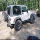1J4FY19S1XP417362 1999 Jeep Wrangler Sport auction photo thumbnail 4