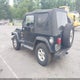 1J4FA59S41P376079 2001 Jeep Wrangler Sahara auction photo thumbnail 3