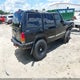 1J4FF48SX1L572886 2001 Jeep Cherokee Sport auction photo thumbnail 4