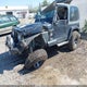 1J4FA59SXYP788498 2000 Jeep Wrangler Sahara auction photo thumbnail 2