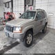 1J4GW48N6YC231509 2000 Jeep Grand Cherokee Laredo auction photo thumbnail 2