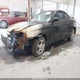 KMHJG25F51U226016 2001 Hyundai Tiburon Base Pkg 1 2 auction photo thumbnail 2
